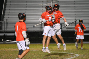 High School Students playing lacrosse