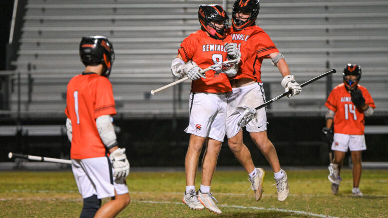 High School Students playing lacrosse