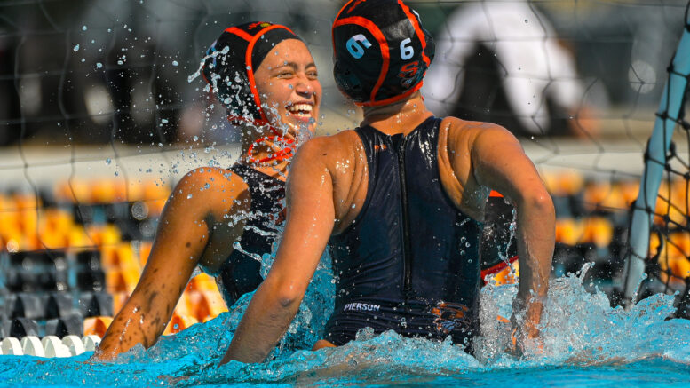 High School Students playing water polo