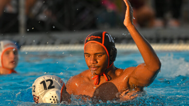 High School Students playing water polo